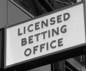 old licensed betting office sign